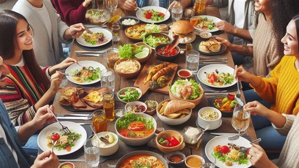 العائلة و الأصدقاء حول مائدة الطعام 